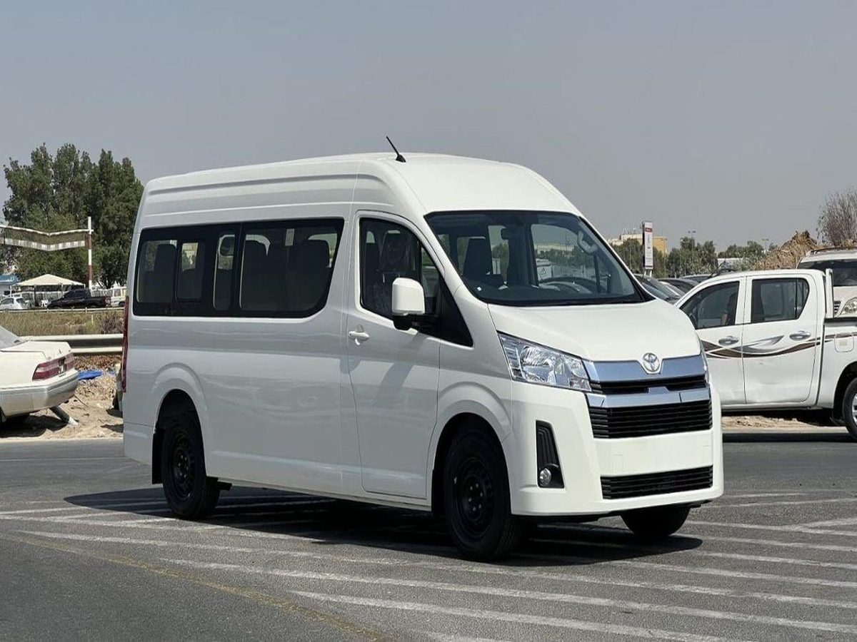 Toyota Hiace high roof van used for daily staff pick and drop in Dubai